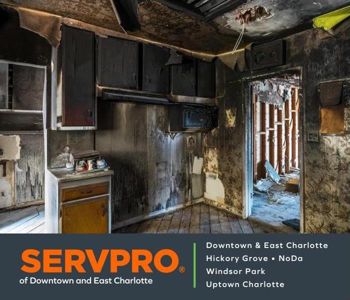 Kitchen with fire, smoke, soot and water damage